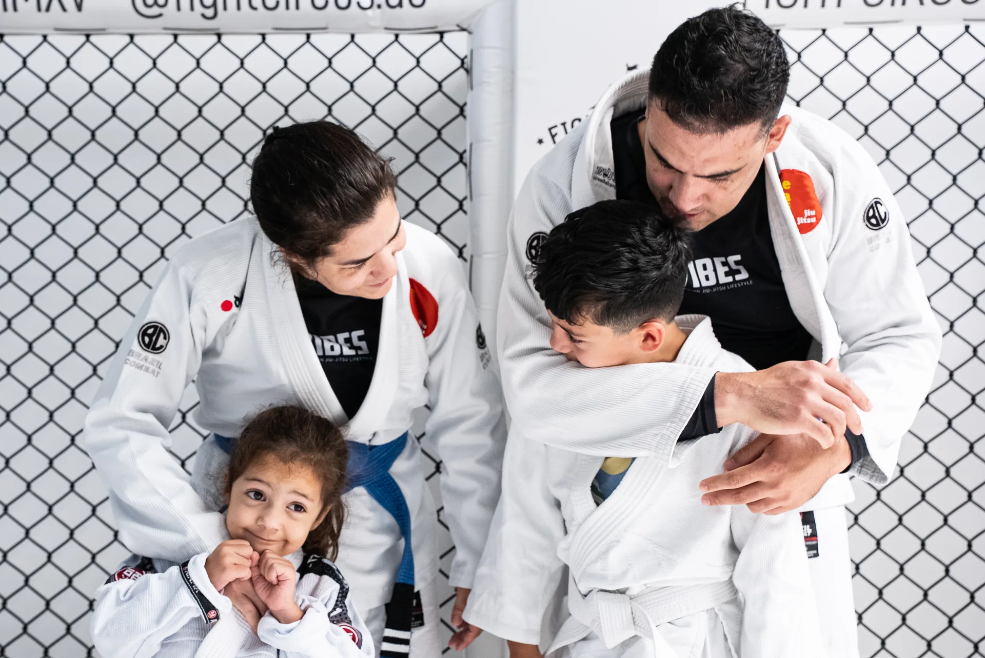 Adults and children together on the mat at VIBES.